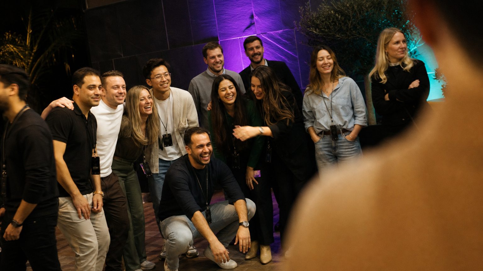A mixed group of ten colleagues mid-activity