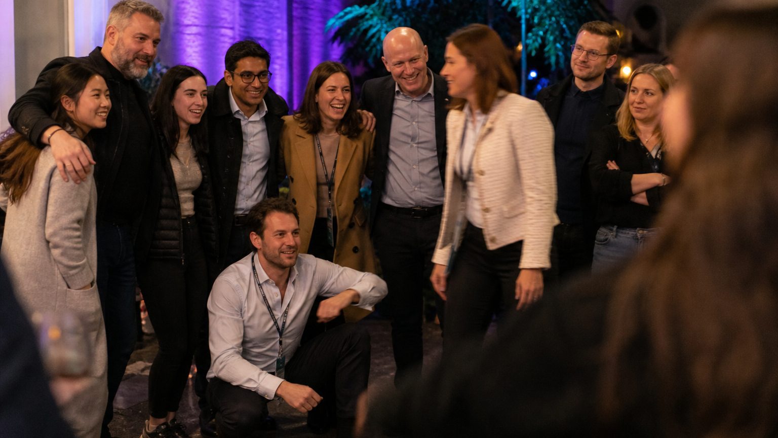 A mixed group of ten colleagues mid-activity