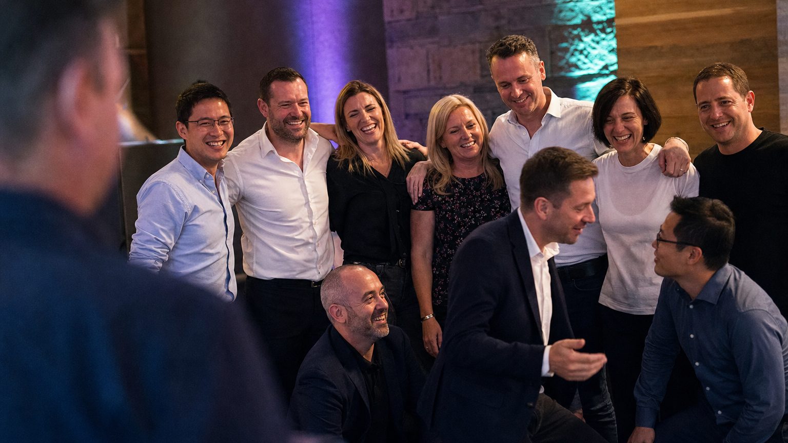 A mixed group of ten colleagues mid-activity